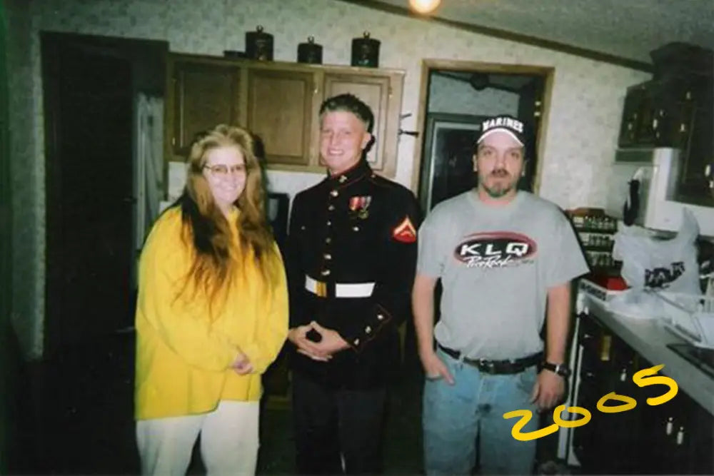 Danny in Marine Corps dress blues with his mom Melissa and stepdad, 2005
