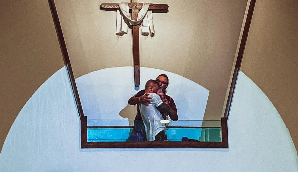 Danny being baptized